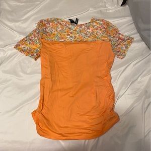 A orange floral T shirt